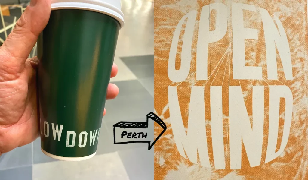 Ein Kaffeebecher mit der Aufschrift Slow Down aus Perth/Australien